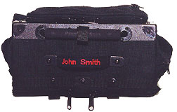Top view of luggage with monogramed handle
